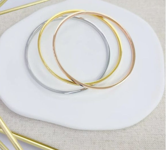 Trio de Pulseras Bangle Tres Tonos. Stainless Steel