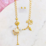 Cadena motivo del mar,conchas grandes,pequeñas,estrellas,caracoles,perlas