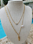 Set de cadena doble de caballito del Mar con perla en forma de corazon. Trae pantallas