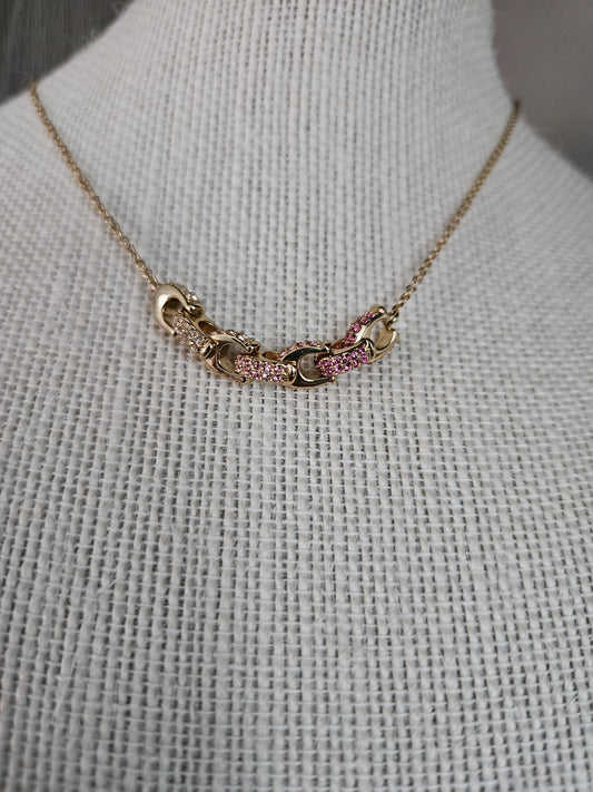 Cadena Coach detalles rosa
