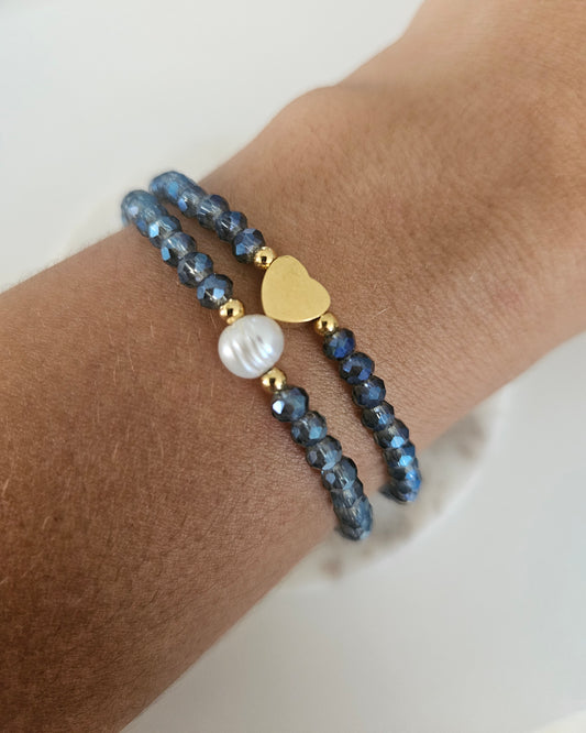 Set de dos pulseras tornasol azul.