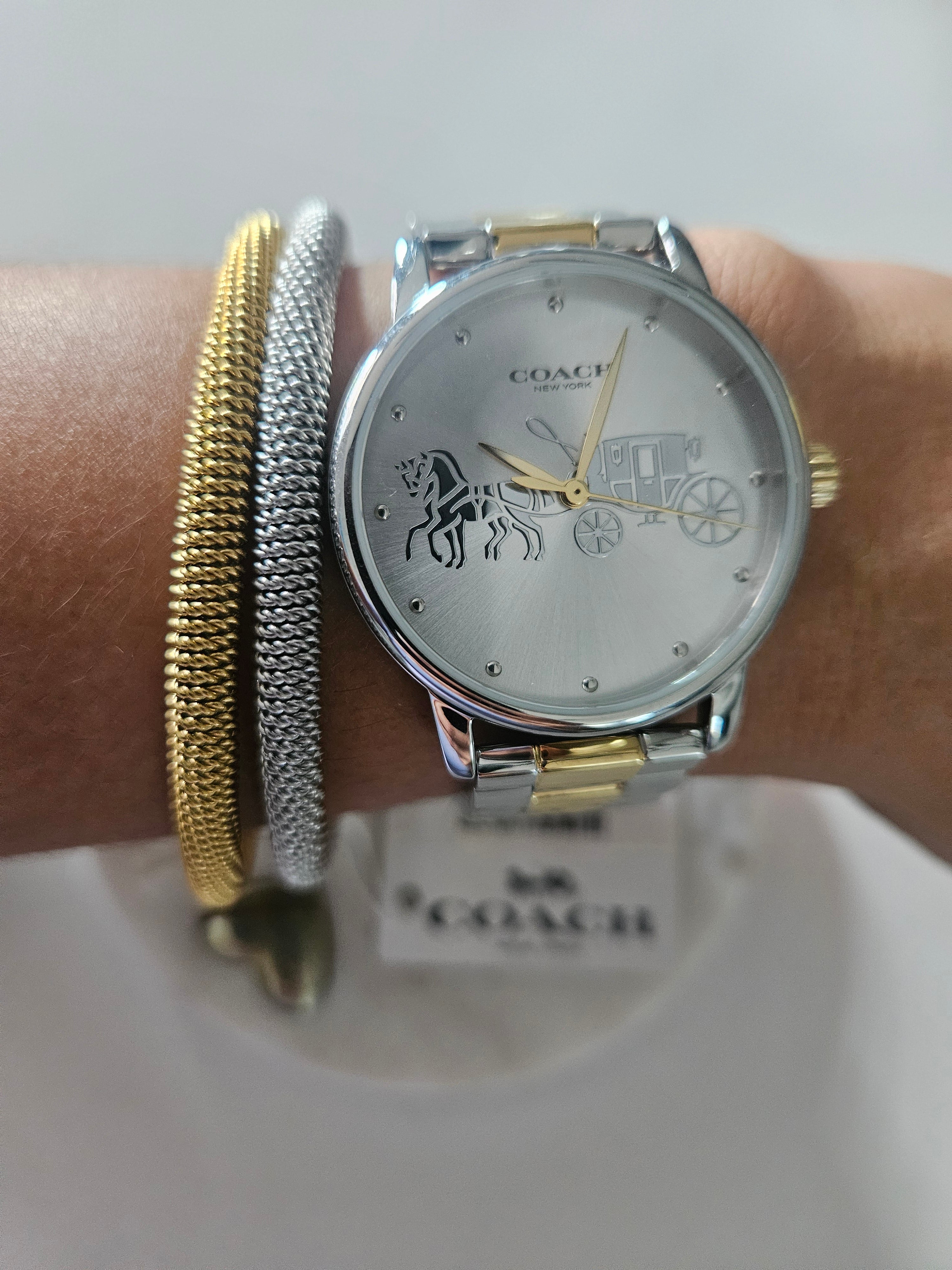 Reloj Coach oro,plata