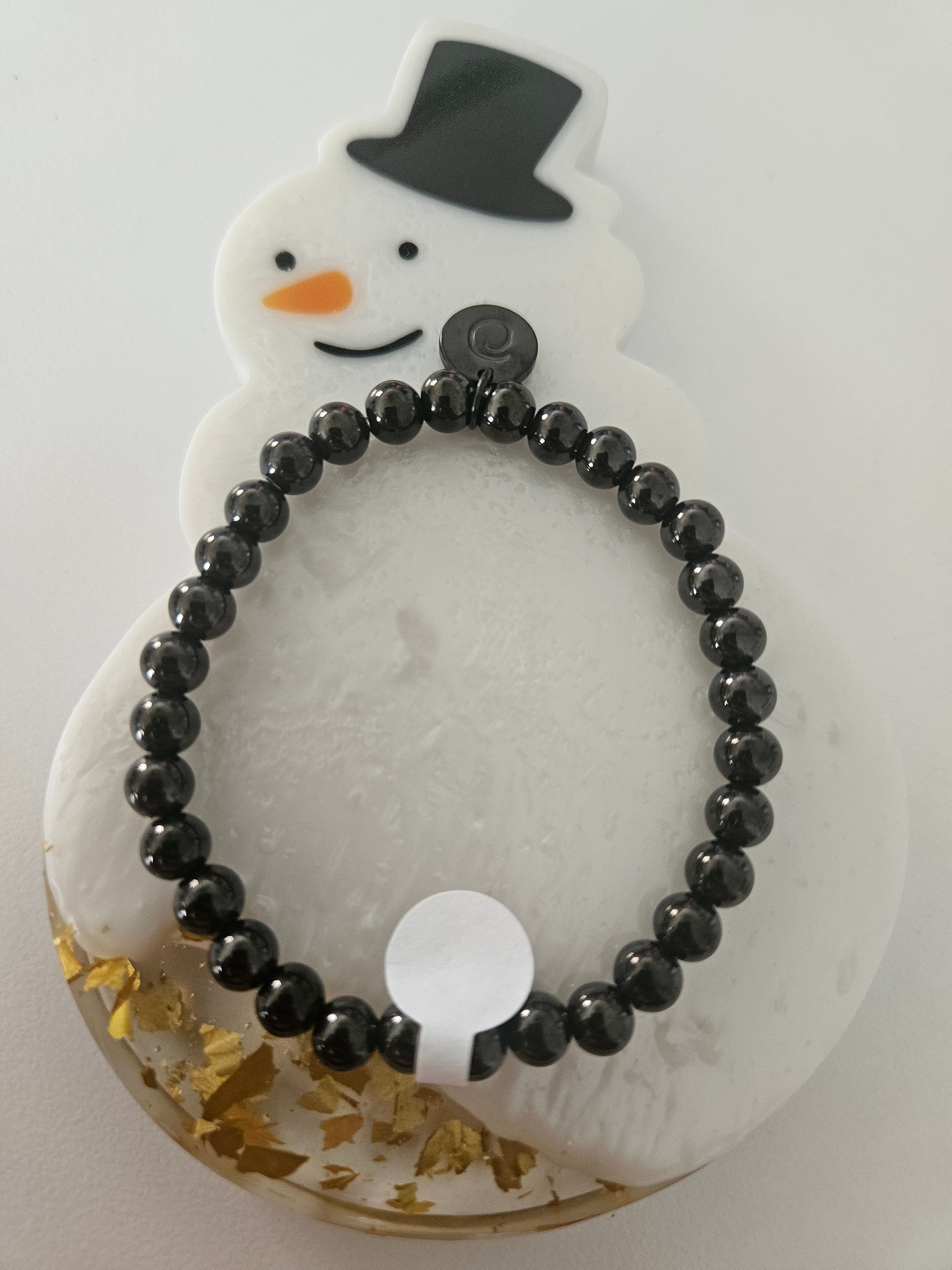 Pulsera negra con olita stainless steel. Adjunto otras fotos para que puedas hacer combinaciones.