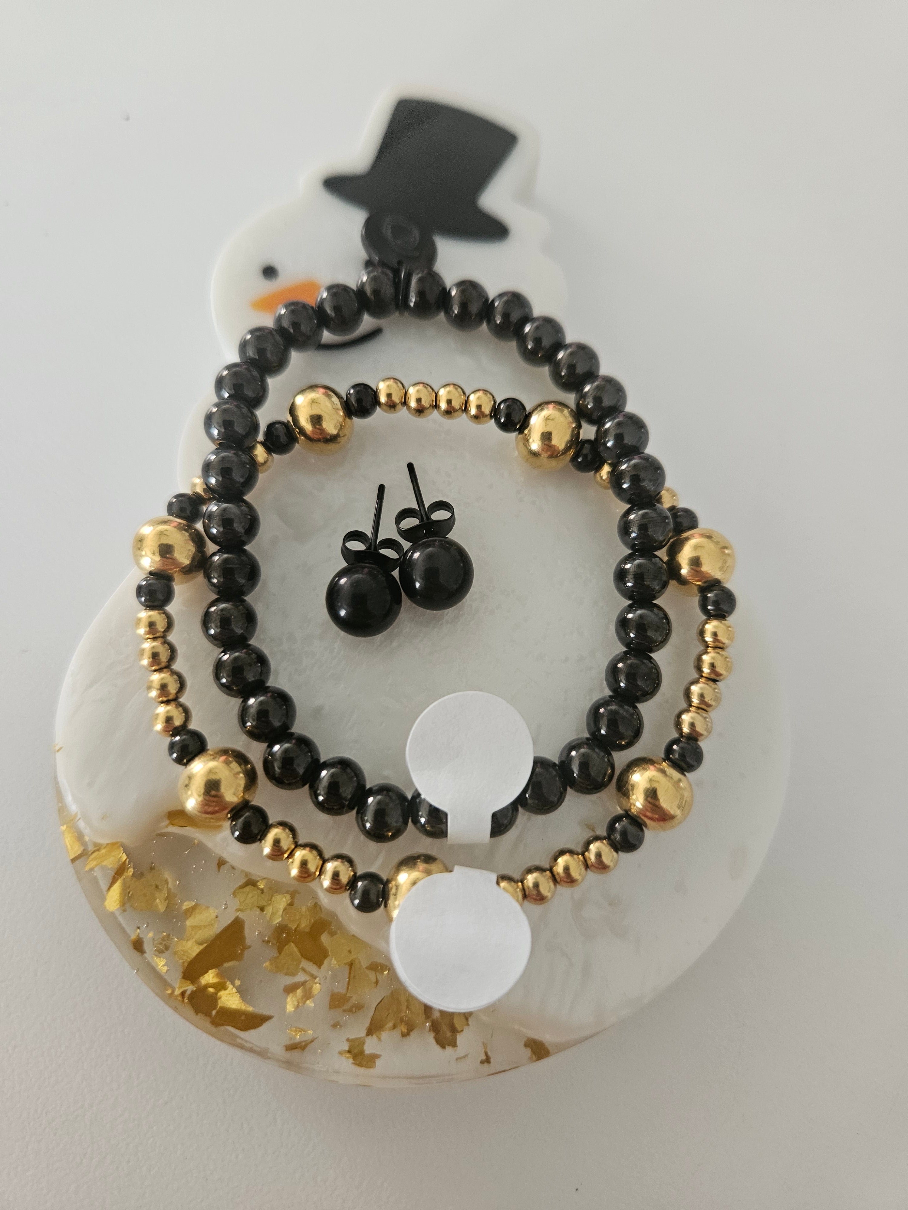 Pulsera negra con olita stainless steel. Adjunto otras fotos para que puedas hacer combinaciones.