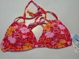 Top Roxy de bikini tricolor Tiki con flores de pradera