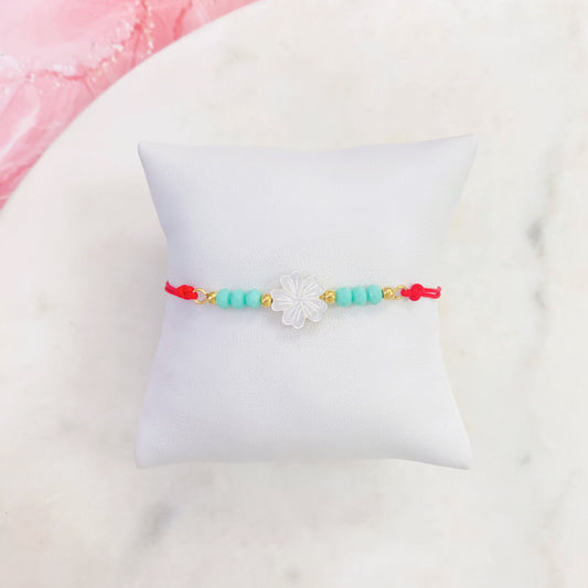 Pulsera de hilo,flor