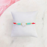 Pulsera de hilo,flor