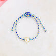 Pulsera de hilo ajustable. Motivo de luna