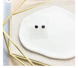 Pantallas negras,a la vuelta redonda oro,plata.