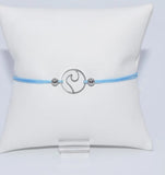 Pulsera de hilo ajustable. Motivo de Ola