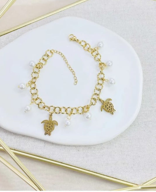 Pulsera de tortugas,con perlas,eslabones